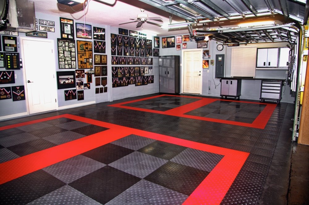 Cool garage with RaceDeck black and red garage flooring