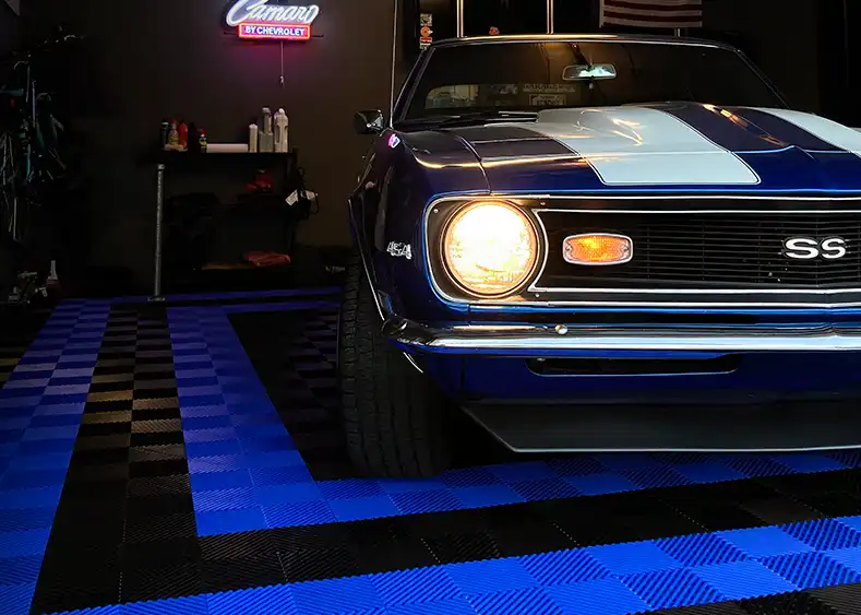 Camaro SS in a garage with Black and Blue RaceDeck Free-Flow.
