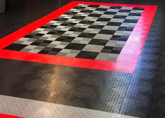 A custom garage floor mixing different types of tiles available from BigFloors.